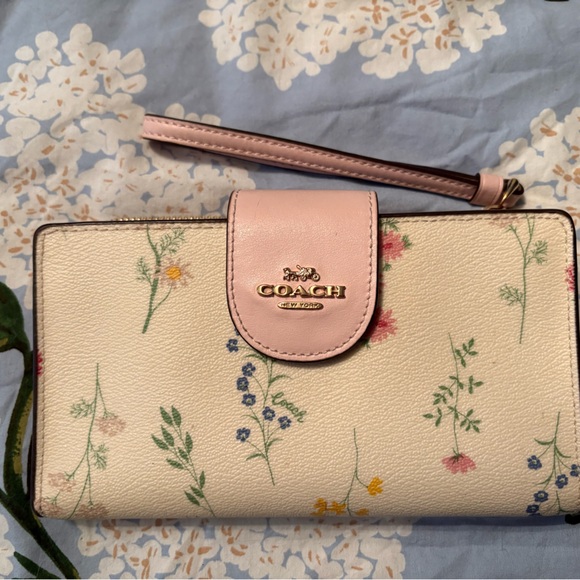Coach Handbags - Coach Cream Floral Tech Wallet Wristlet